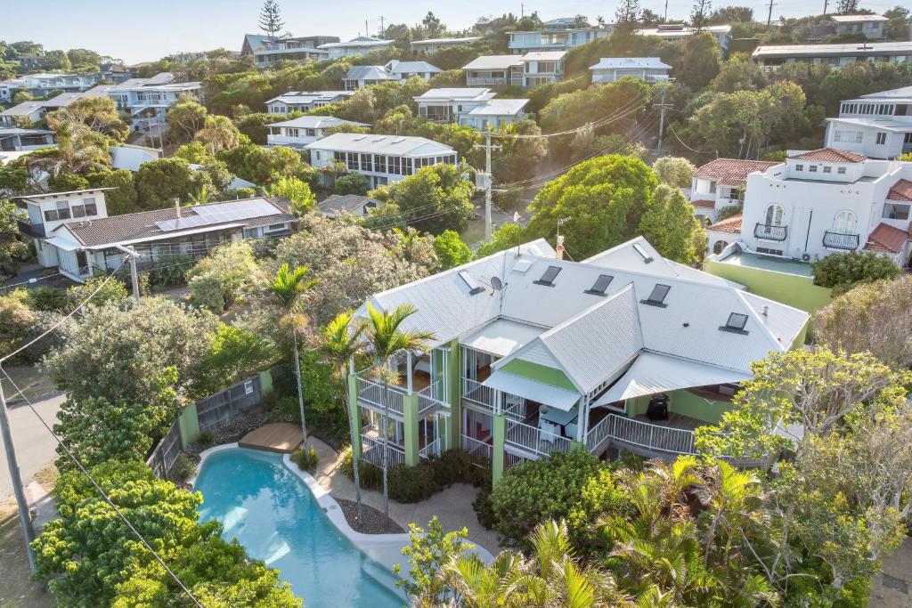 an aerial view of a house with a swimming pool at Beachside Bliss - Ocean View, Pool, Sauna in Peregian Beach