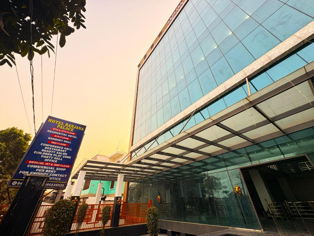 a building with a sign in front of it at Hotel Ranjana Palace in Pūrnia
