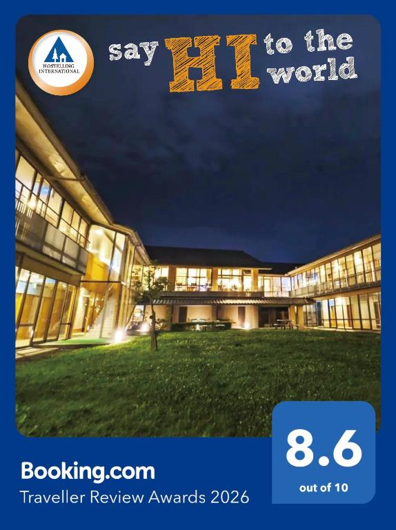 a building with the words say to the world at Kyoto Utano Youth Hostel in Kyoto