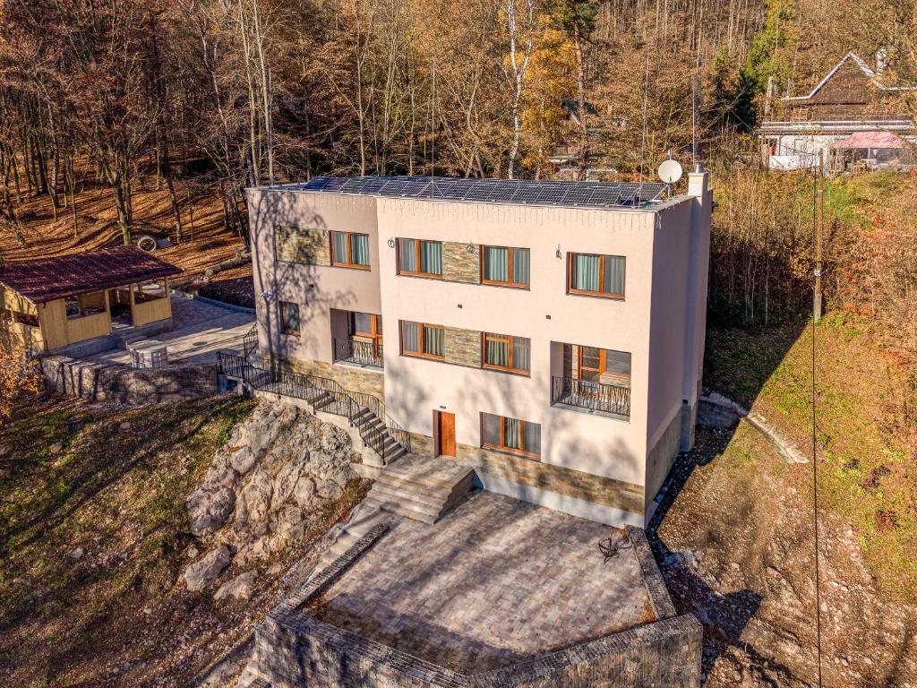 an aerial view of a house on a hill at Vila SIGORD in Kokošovce