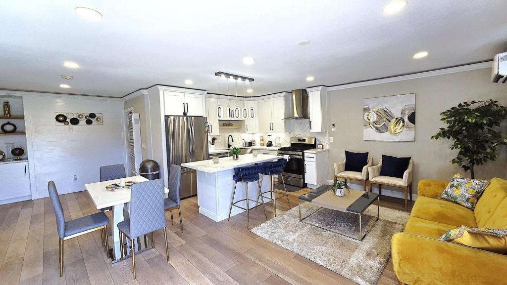 a kitchen and living room with a couch and a table at Gillespie Dr 2BR 1BA Unit A | Near Downtown SD in Spring Valley