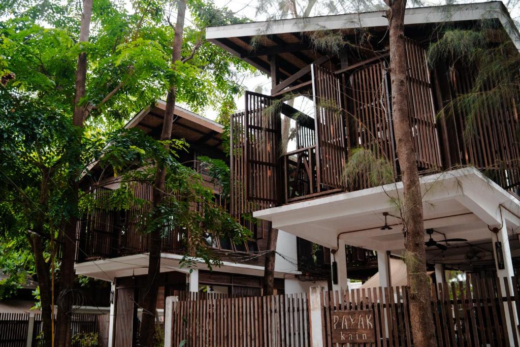 a building with balconies on the side of it at Alun Hostel in San Felipe