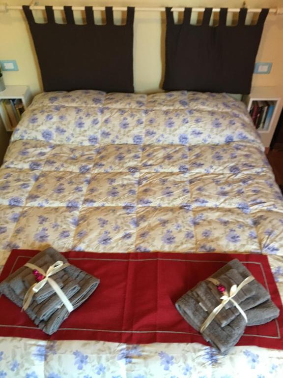 Postel nebo postele na pokoji v ubytování Mondello Room