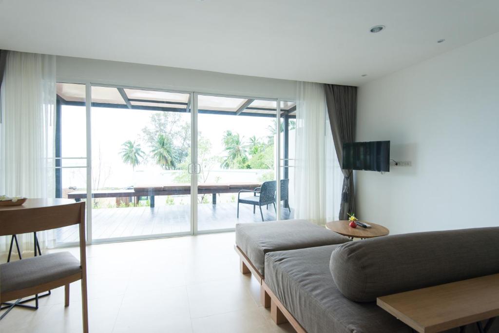 TV a/nebo společenská místnost v ubytování SEAnery Beach Resort
