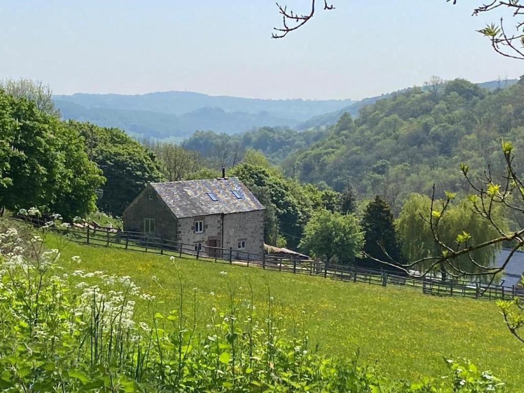 an old house on a hill in a field at 2 Bed in Matlock oc-83435 in Bonsall