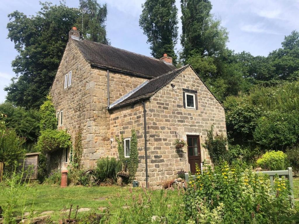 an old stone house in the middle of a field at 3 Bed in Belper oc-85797 in Crich