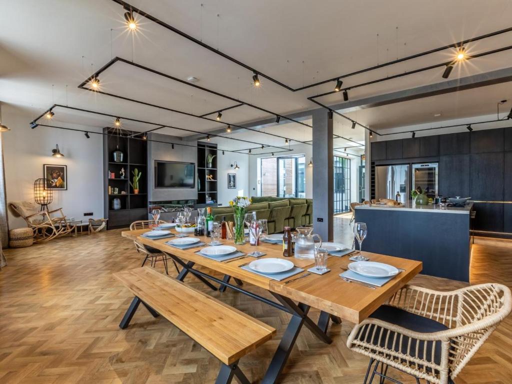 a dining room with a long table and chairs at 5 Bed in Bideford oc-78690 in Bideford