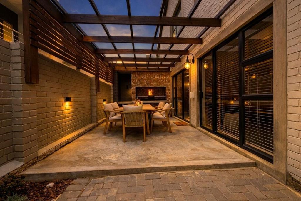 a patio with a table and chairs on it at Rustic Hills #25 in Swakopmund