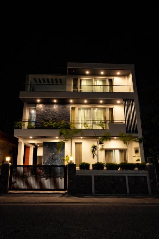 a lit up house at night with lights at Casa37 in Jaipur