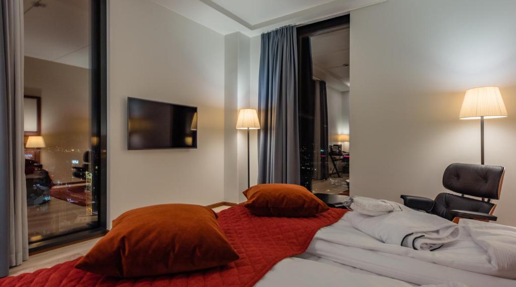 Postel nebo postele na pokoji v ubytování Clarion Hotel Helsinki