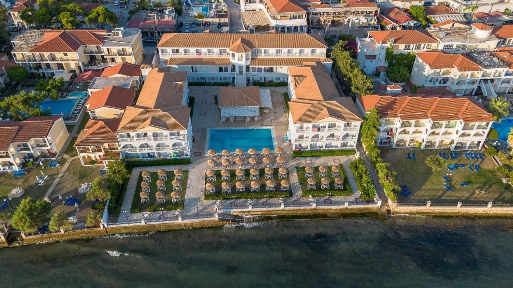 an aerial view of a house on the water at Meridien Beach Hotel in Argassi