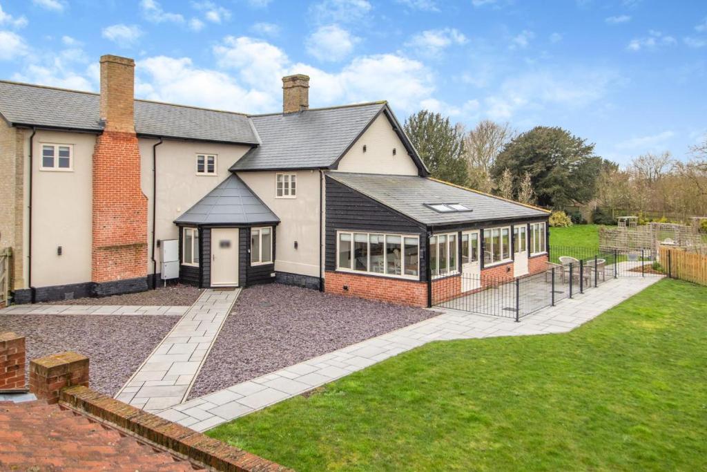 an image of a house with a large yard at 2 Bed in Heveningham oc-w29034 in Heveningham