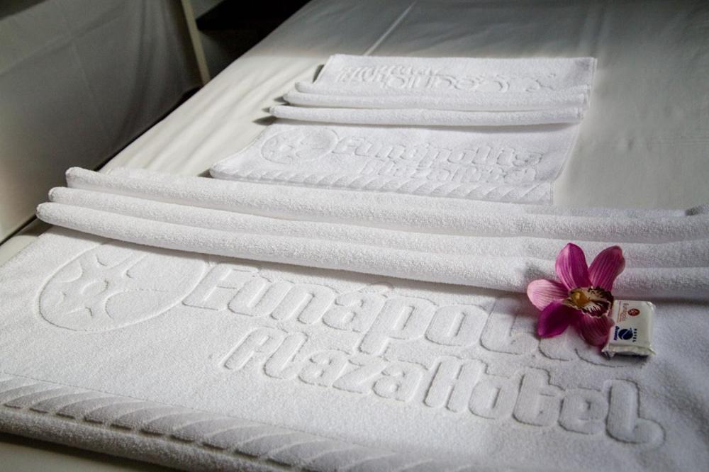 Postel nebo postele na pokoji v ubytování Eunapolis Plaza Hotel