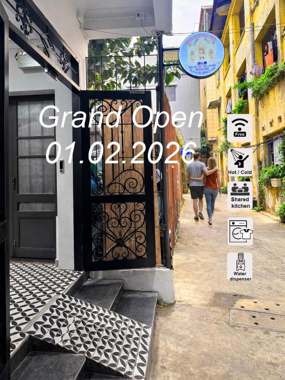 a door with a sign that reads garden open at Hotel Hc Luxury Apartment in Hanoi
