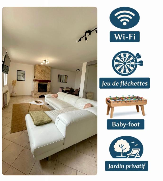 a living room with a white couch and a table at Le Gite Zoé in Bourbourg