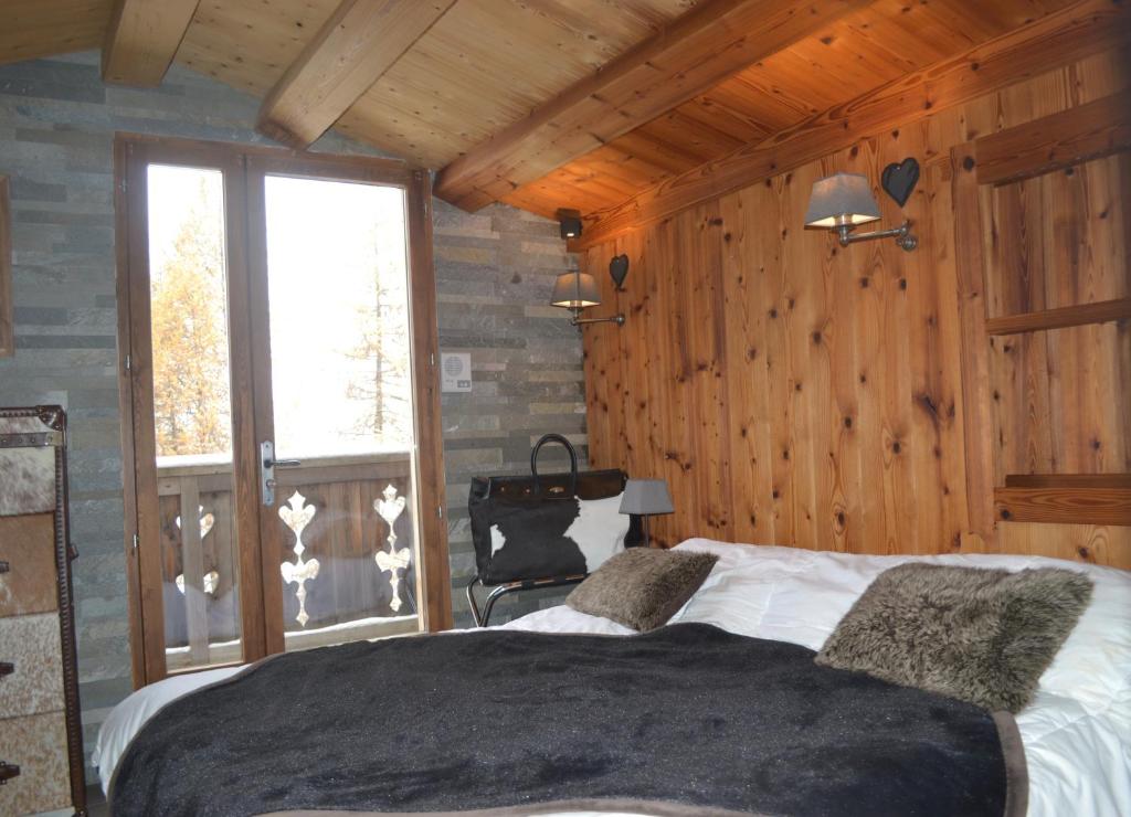 Postel nebo postele na pokoji v ubytování Le Solan d'Aniathazze