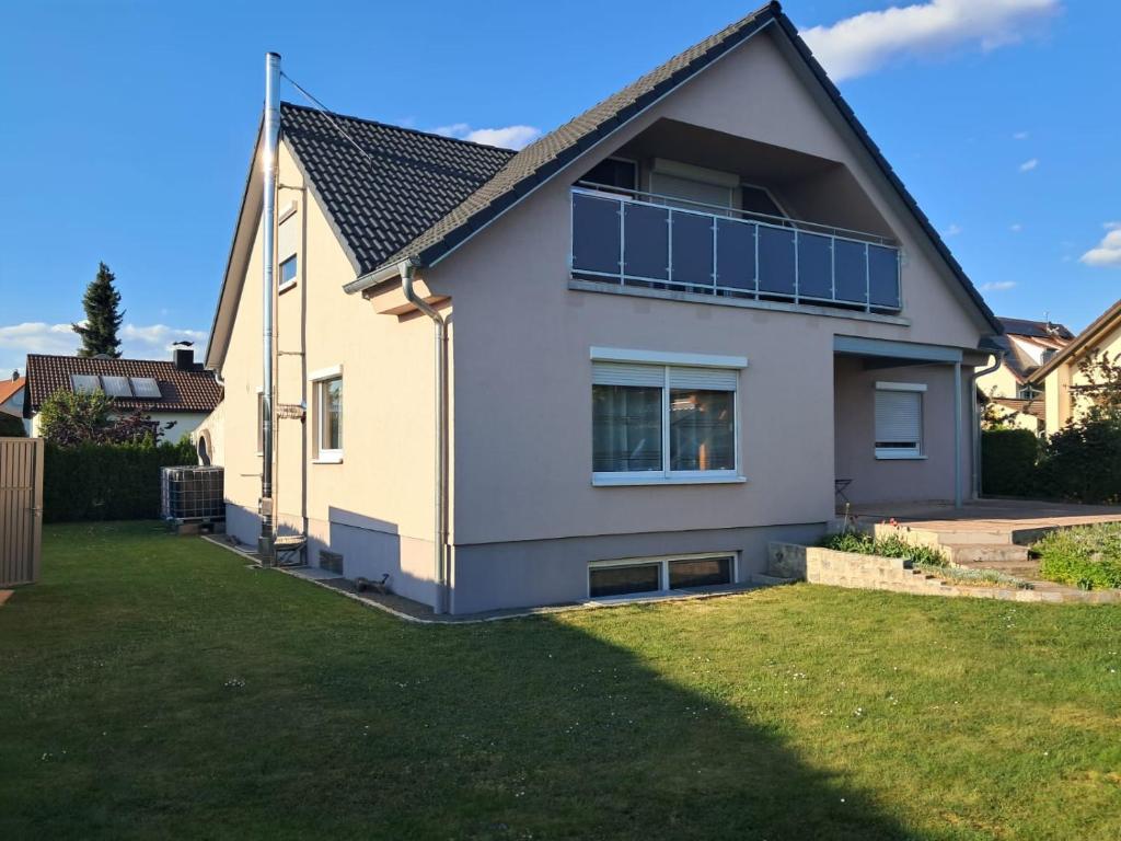 a house with a solarium on the side of it at Ferienwohnung Sonnenschein mit Sauna und Billiard in Wachstein