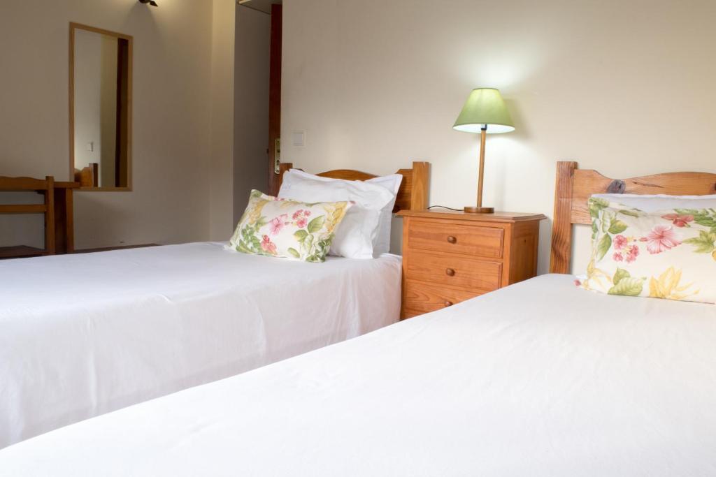 Postel nebo postele na pokoji v ubytování Quinta Do Crestelo Aparthotel