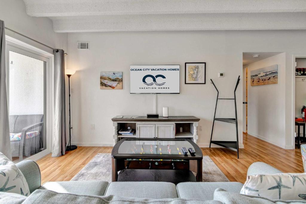 a living room with a couch and a table at Tiburon 5B in Ocean City