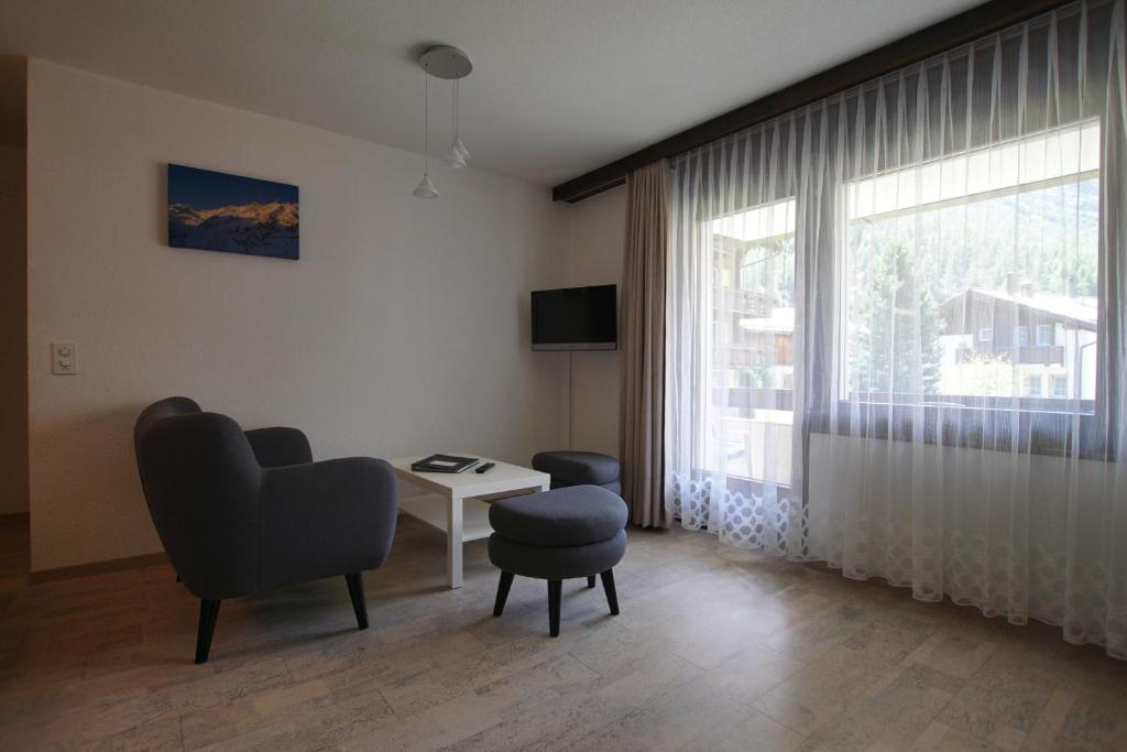 TV a/nebo společenská místnost v ubytování Haus Amor