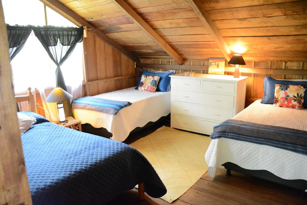 Postel nebo postele na pokoji v ubytování Casa de Piedra
