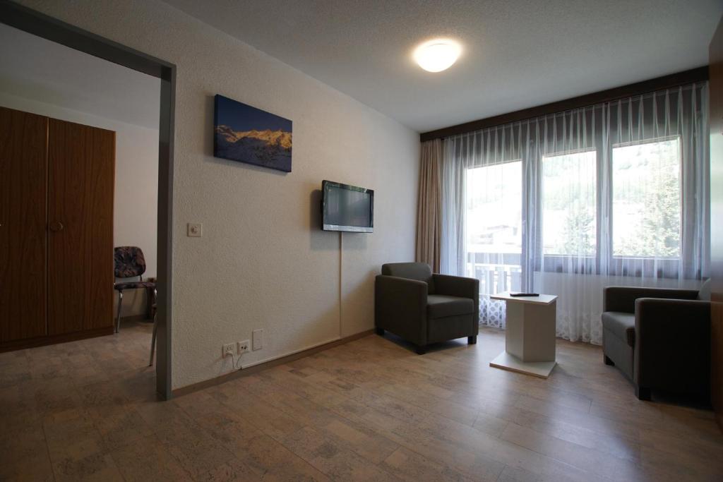 TV a/nebo společenská místnost v ubytování Haus Amor
