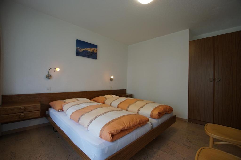 Postel nebo postele na pokoji v ubytování Haus Amor