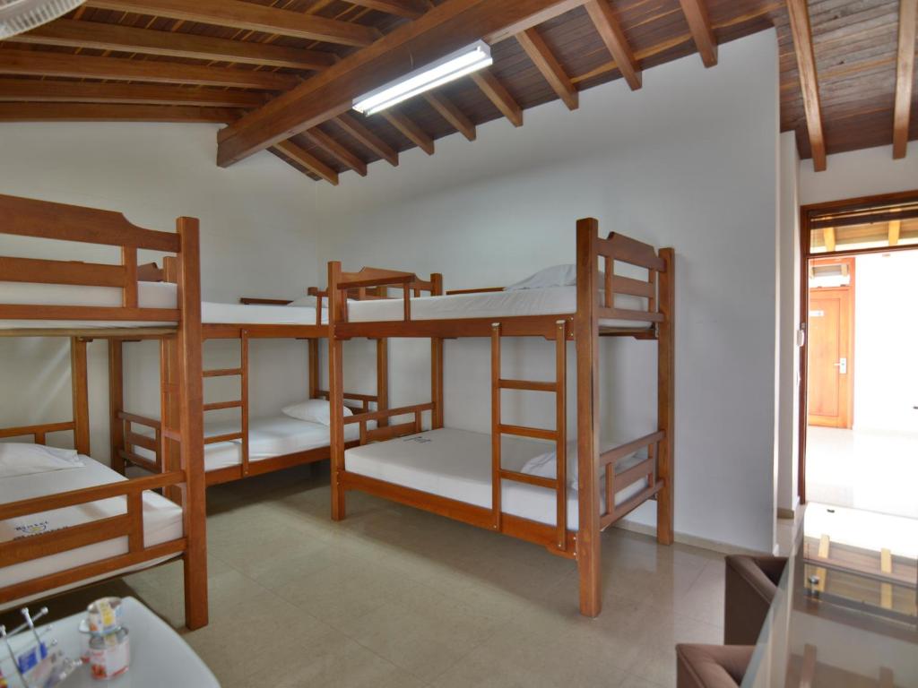 Postel nebo postele na pokoji v ubytování Hotel Monarca
