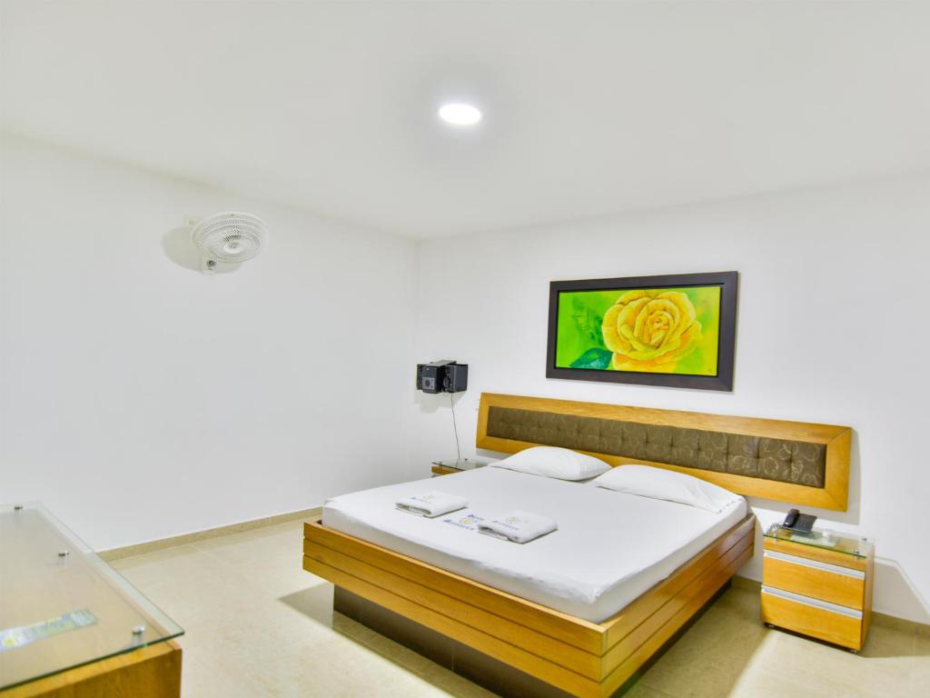 Postel nebo postele na pokoji v ubytování Hotel Monarca
