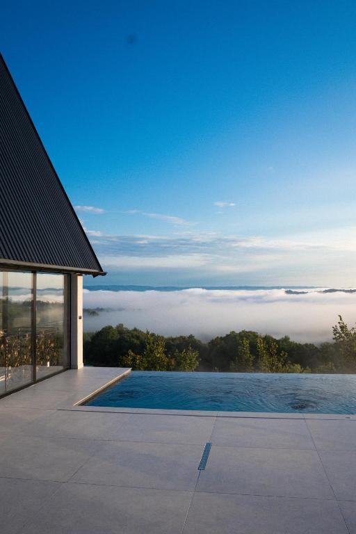 a view of a swimming pool from a house at Villa Gaia Novi Grad in Jablanica