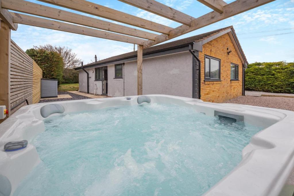 a hot tub in the backyard of a house at 3 Bed in Rhyl oc-p30593 in Rhyl