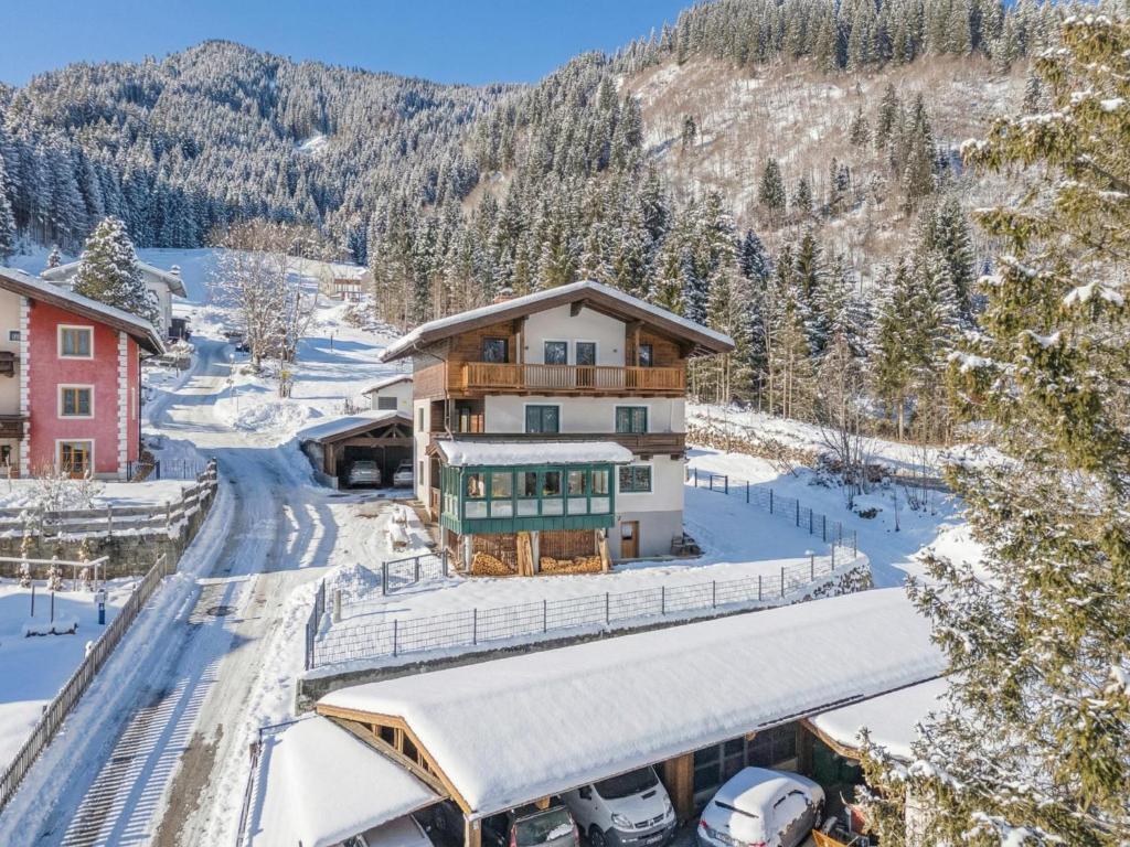 an aerial view of a house in the snow at Glückauf in Krimml