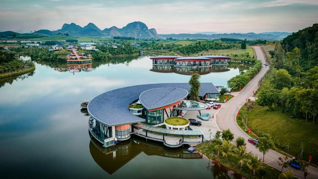 an aerial view of a resort on a lake at Lamori Resort & Spa, Thanh Hoá in Thanh Hóa
