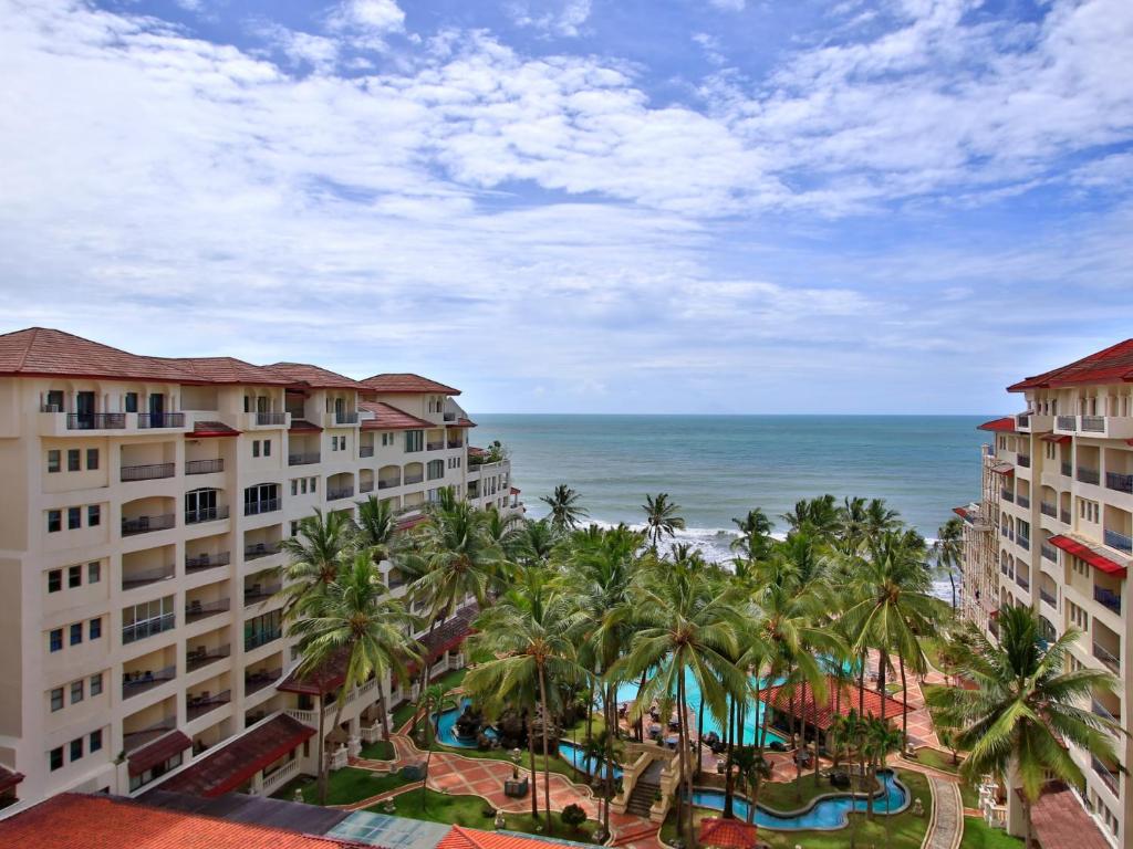 a view of the ocean from the balcony of a resort at Marbella Place Anyer by Jayakarta in Kamasan