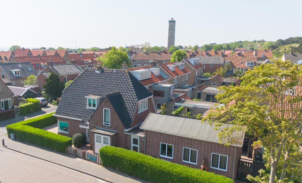 a group of houses in a residential neighborhood at Riposo in West-Terschelling