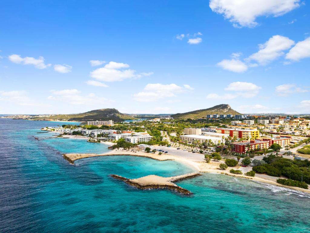 an aerial view of a beach in a resort at Parasasa Hotel Curacao in Willemstad