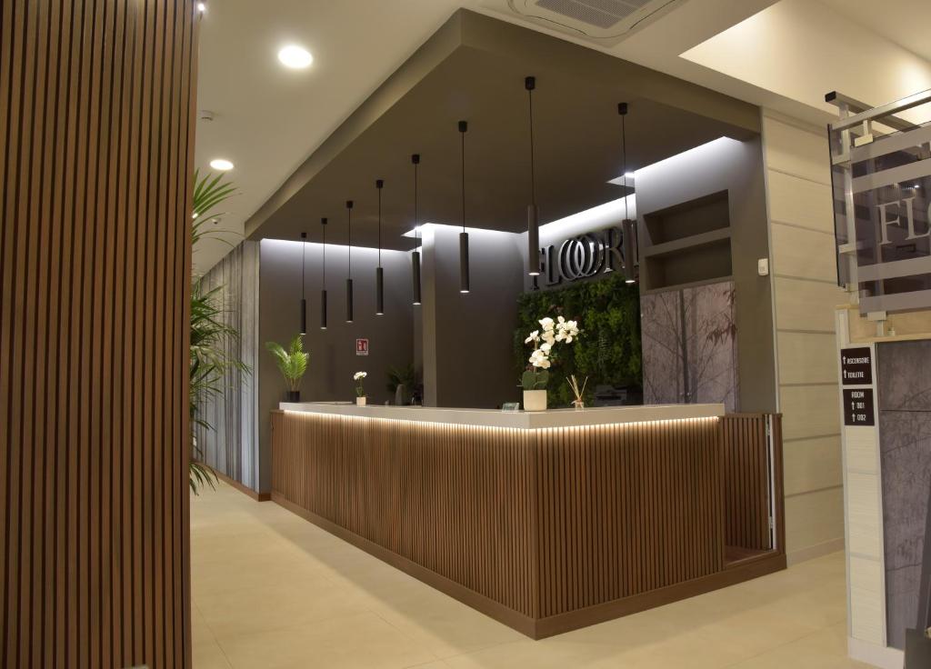 a lobby of a store with a reception desk at Hotel Floris in Rende