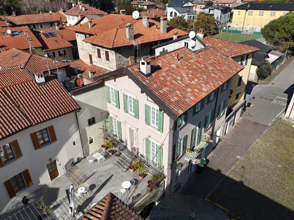 an overhead view of a town with white buildings at Locanda Alberti in Mandello del Lario