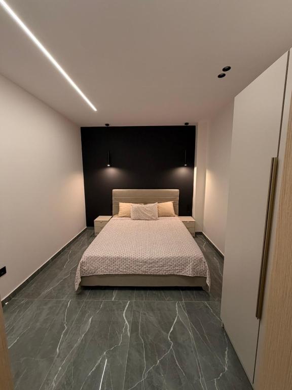 Llit o llits en una habitació de Monda Apartment 3