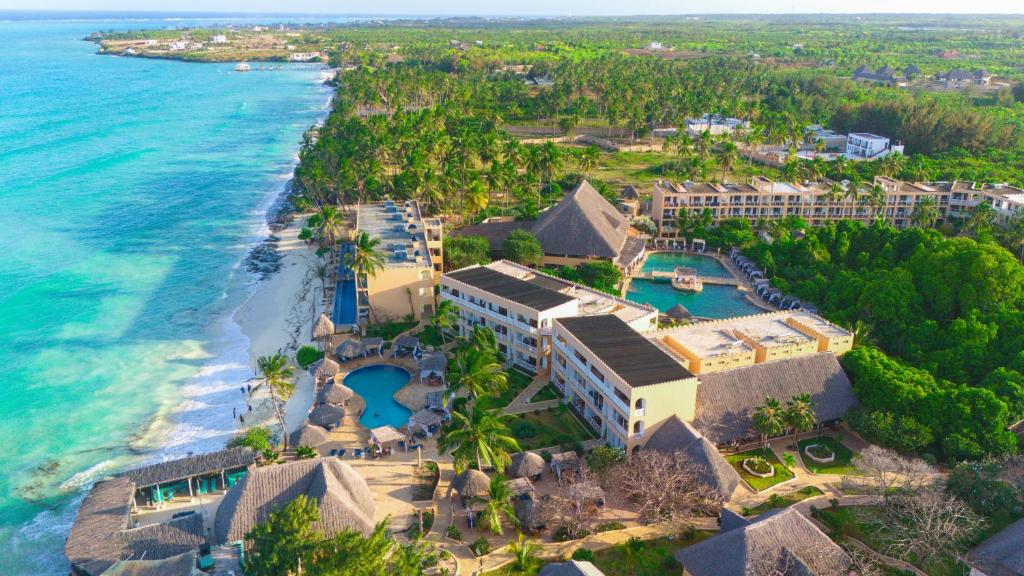 an aerial view of the resort and the ocean at Reef & Beach Resort - Spa Jambiani in Jambiani
