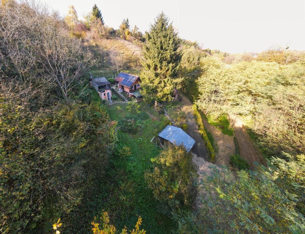an aerial view of a house on a hill at Rokova Dolina in Draganovac