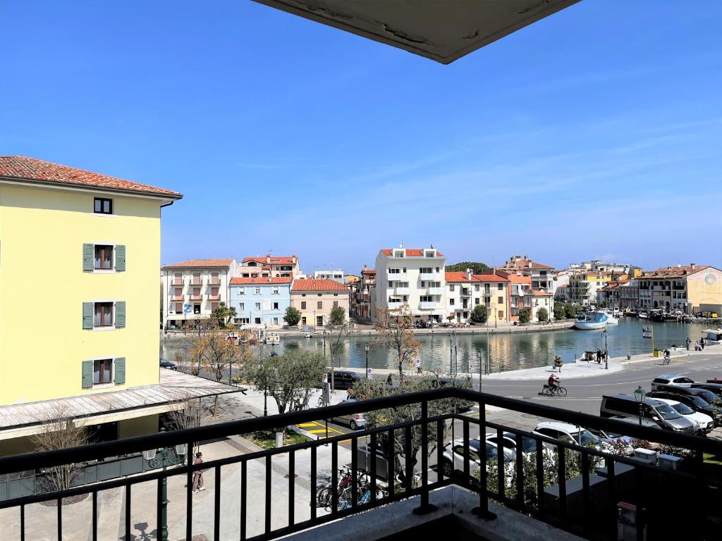 a view of a city with a river and buildings at Campo Porta Nuova in Grado
