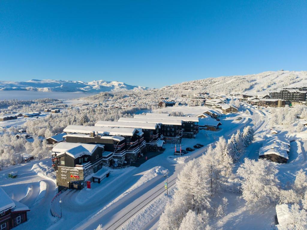 an aerial view of a resort in the snow at Stølstunet Leilighet 617 in Beitostøl