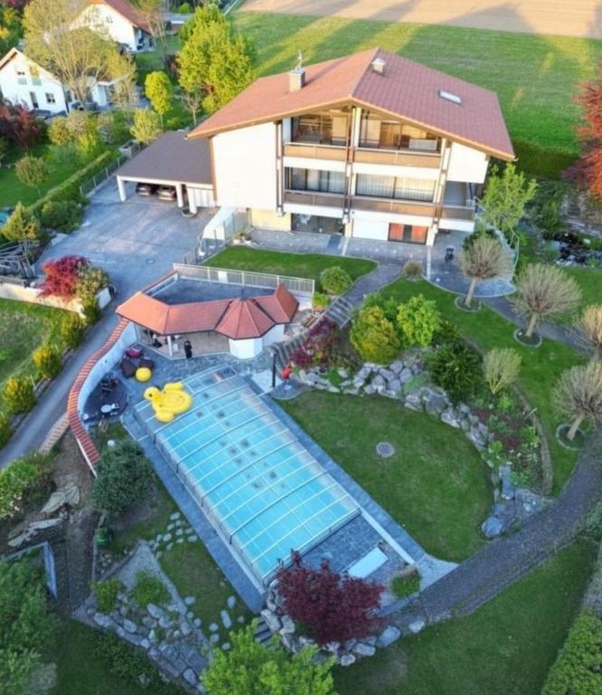 an aerial view of a house with a swimming pool at Your Perfect Escape to Relax in Sipbachzell