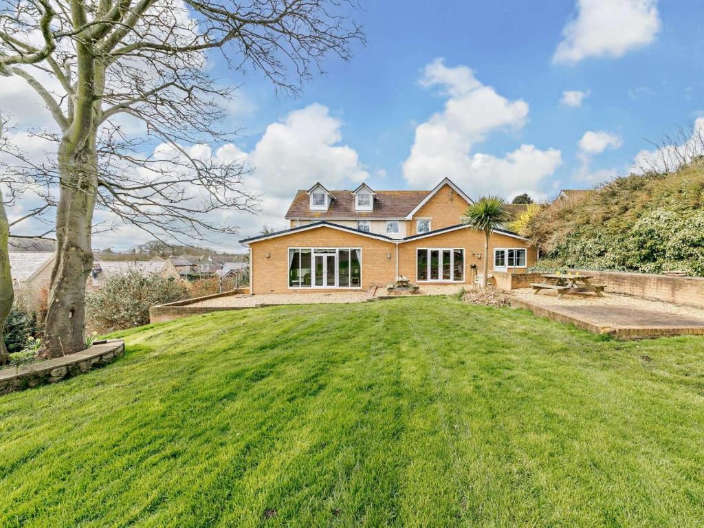 a large house with a large grass yard at 6 Bed in Morpeth oc-91805 in Ellington