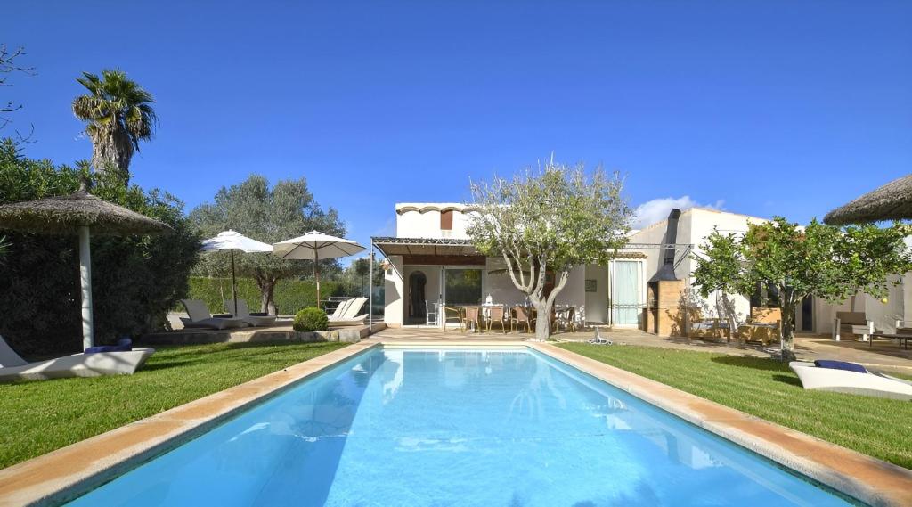 a swimming pool in the backyard of a house at Collet De Manacor in Manacor