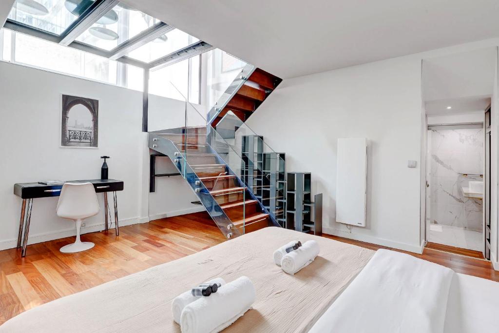 Appartement de luxe sous verrière en plein coeur du Marais
