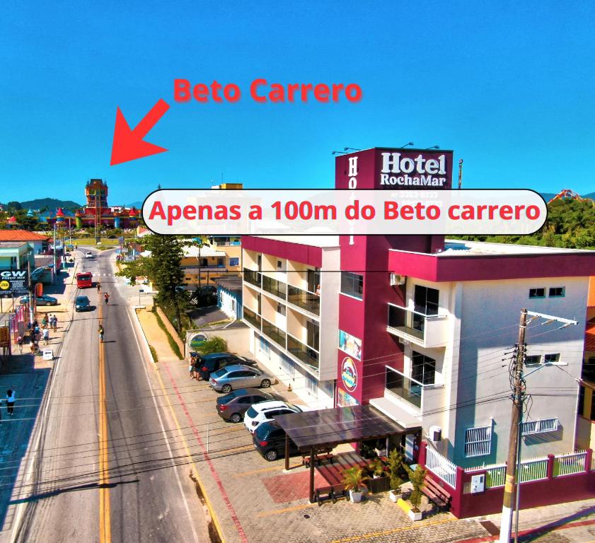 a view of a city street with a sign that says beta carricaagents at Hotel Rochamar in Penha