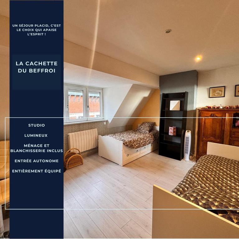 a room with a bedroom with a bed in it at La cachette du Beffroi - Appt 30 m² centre Arras in Arras