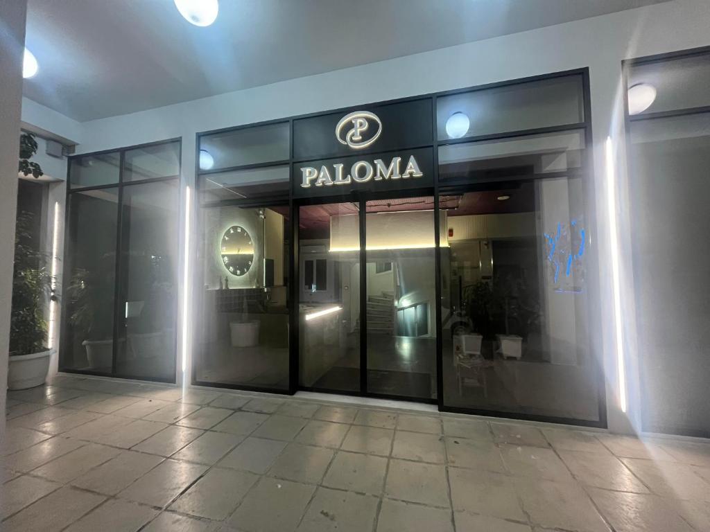 a building with aidium sign on the front of it at Paloma in Athens
